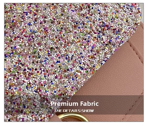 Close-up of colorful sequins and brown lychee grain faux leather on a chain bag