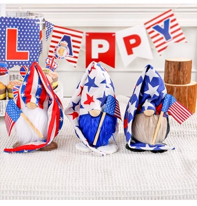 Three Independence Day faceless gnomes with patriotic stars and stripes motifs