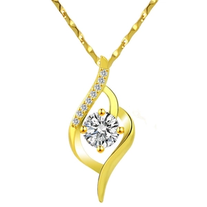 Elegant gold heart pendant necklace with shimmering zircon center and spiral diamond accents