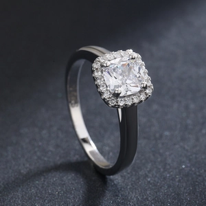 Elegant S925 sterling silver ring with square-cut zircon stone and pavé halo setting