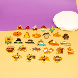 Detailed collection of Thanksgiving enamel charms featuring pumpkin turkey and maple leaf shapes