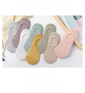 Detailed close-up of summer mesh breathable invisible socks in various pastel colors