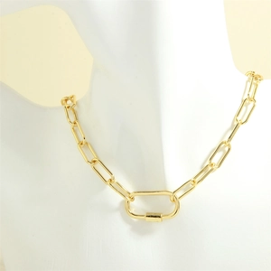 Detail of gold rectangular link chain with industrial screw clasp pendant on model bust