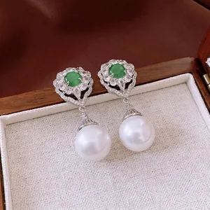 Vintage silver needle earrings with green cat-eye stone, rhinestones and large round pearl