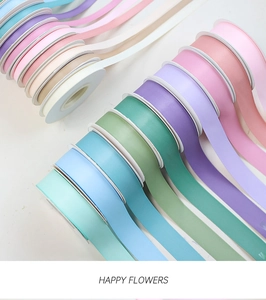 Close-up of matte polyester ribbons in various Macaron colors for gift wrapping