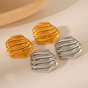 Fashion 18K gold and silver stainless steel earrings with irregular rock texture