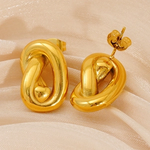 Boucles d'oreilles vintage en acier titane plaqué or 18K avec forme ovale torsadée