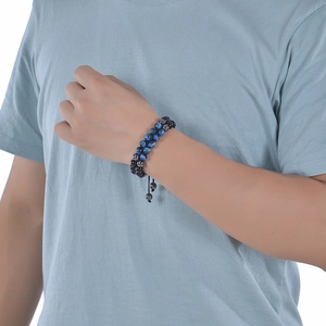 Double-layer braided bracelet with blue tiger eye and obsidian beads on male wrist