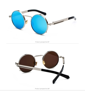 Detail of vintage steampunk sunglasses featuring unique spring metal temples and round frame