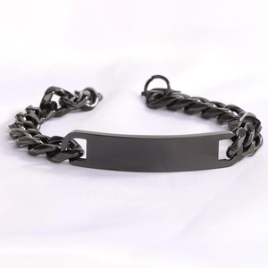 Close-up of black stainless steel 11mm Cuban link bracelet with blank engravable bar