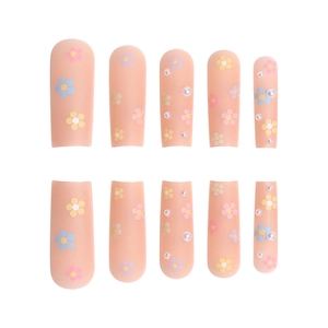 Matte pink coffin press-on nails with floral patterns and delicate pearl accents