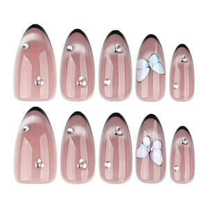 French tip black cat eye press-on nails with almond shape and butterfly rhinestones