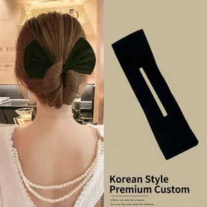 Elegant black velvet bow hair bun maker for women with quick twist styling design