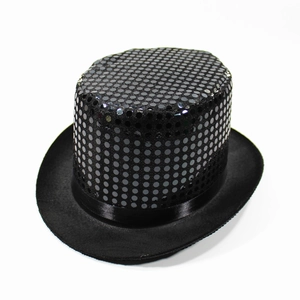 Close-up of black top hat with silver sequins and satin ribbon for stage performance