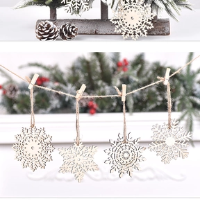 Detail of DIY snowflake wood slices on twine with mini clips for Christmas tree decor