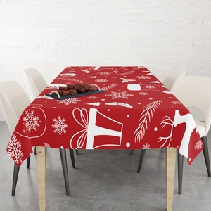 Detailed top view of red Christmas tablecloth with white reindeer and snowflake patterns
