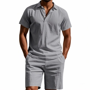 Detail of grey men's linen blend polo and shorts set showing natural fabric texture