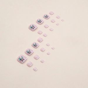 Minimalist French floral press-on toe nails in nude pink with elegant hand-painted flower art