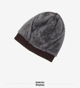 Detailed view of the thick gray fleece lining on a warm winter knitted beanie cap