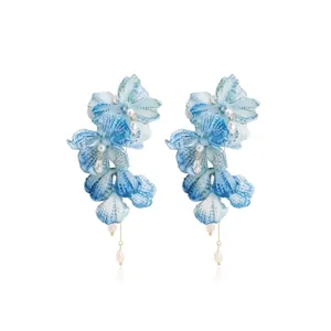 Sparkling light blue petal earrings with hanging crystals and pearls for women