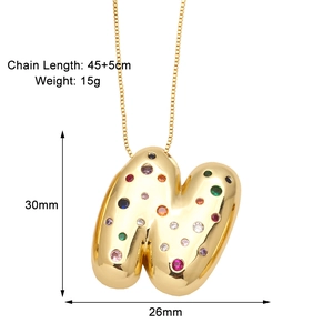 Detail showing letter M gold pendant with colorful zircons and 45+5cm size specs