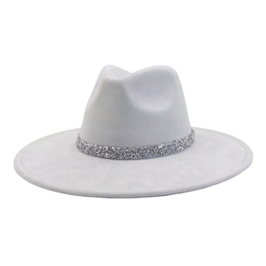 Detail of light grey suede fedora hat with shimmering rhinestone band decoration