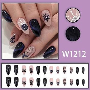 Blue-black night sky almond press-on nails with snowflakes and cat eye glitter finish