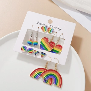 Set of 9 colorful enamel stud earrings in heart and rainbow shapes with gold and silver finish