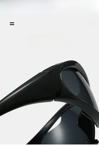 Macro detail of lightweight flexible hinges on black Y2K wraparound sports sunglasses
