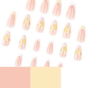 Almond shaped press-on nails with yellow daisy floral prints and white French tip designs