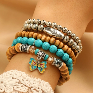 Bohemian multi-layer beaded bracelet with blue turquoise, wood beads and butterfly charm