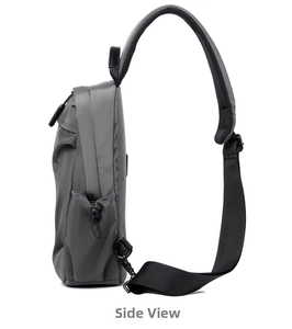 Side view of dark gray nylon crossbody chest bag with adjustable drawstring side pocket