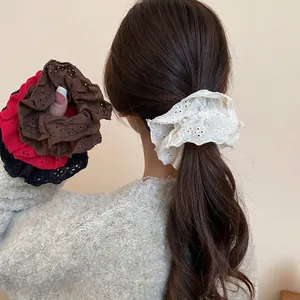 Double-layered lace scrunchie with hollow embroidery in multiple colors for ponytails