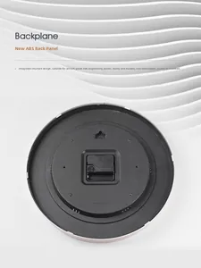 Detail of a black round ABS plastic wall clock backplane with movement and battery slots
