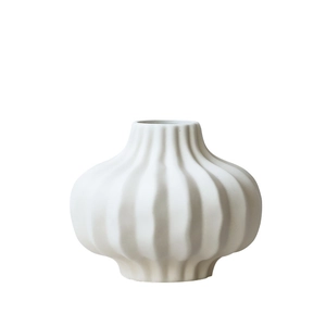 Minimalist cream ceramic vase with vertical ribbed texture for modern home decor