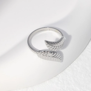 Detailed close-up of adjustable leaf ring in silver finish with realistic leaf texture