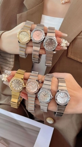Close-up of elegant rhinestone women's metal watch collection in various stylish colors