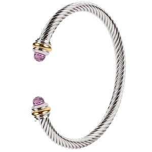 Adjustable stainless steel cable twisted bangle with gold accents and purple gemstone