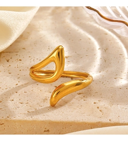 Detail of minimalist gold-plated adjustable ring with abstract hollow geometric shape