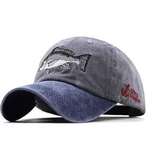 Vintage washed cotton baseball cap with embroidered shark design and curved brim