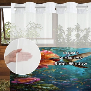 Detail of sheer window curtain with colorful floral hummingbird print and metal eyelets