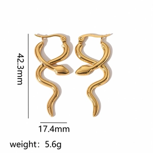 Detail view of 18k gold snake earrings with size measurements 42.3mm x 17.4mm