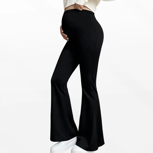 Side view of black maternity flare yoga pants with high waist support for pregnancy