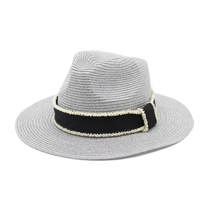 Silver-grey straw Panama hat with black beaded ribbon band for summer beach sun protection