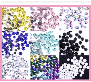 Close-up of colorful resin flatback rhinestones and pearls for DIY nail art decoration