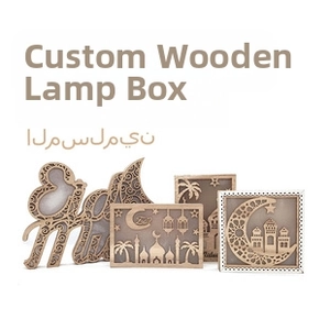 Detail of laser-cut wooden Muslim moon and mosque light boxes for festive home decoration