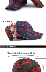 Detail view of cherry pattern baseball cap showing adjustable strap and size measurements