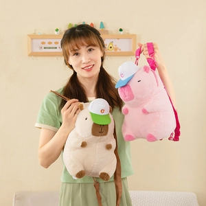 Detailed plush capybara backpacks in beige and pink with cute hats and adjustable straps