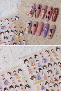 Detail of Chinese style nail stickers featuring elegant lady illustrations and golden poems