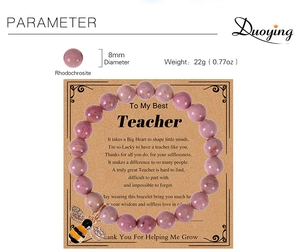 Detail of rhodochrosite beaded bracelet with bee pendant on teacher gift card